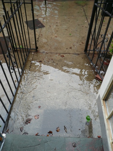 Since the 9am picture, the water rose - the doormat got washed away